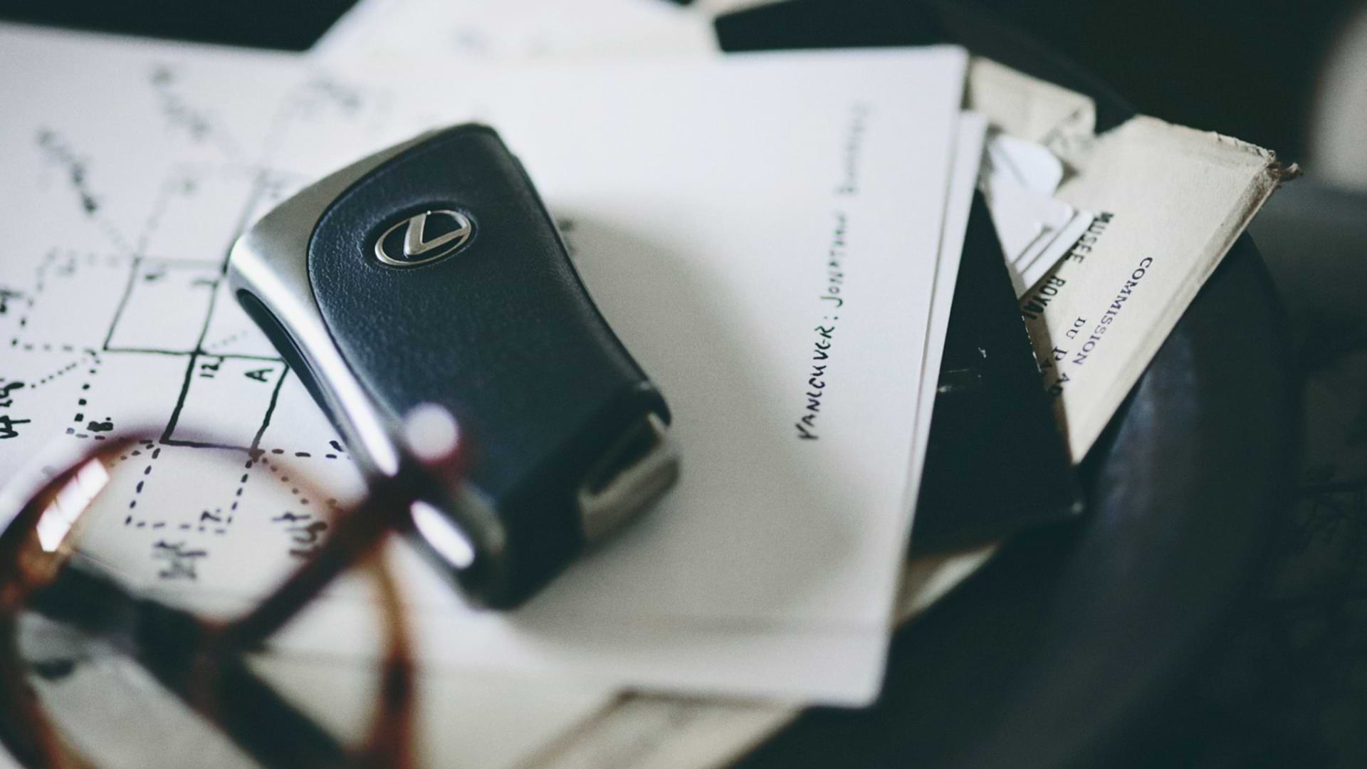Lexus keys on paperwork