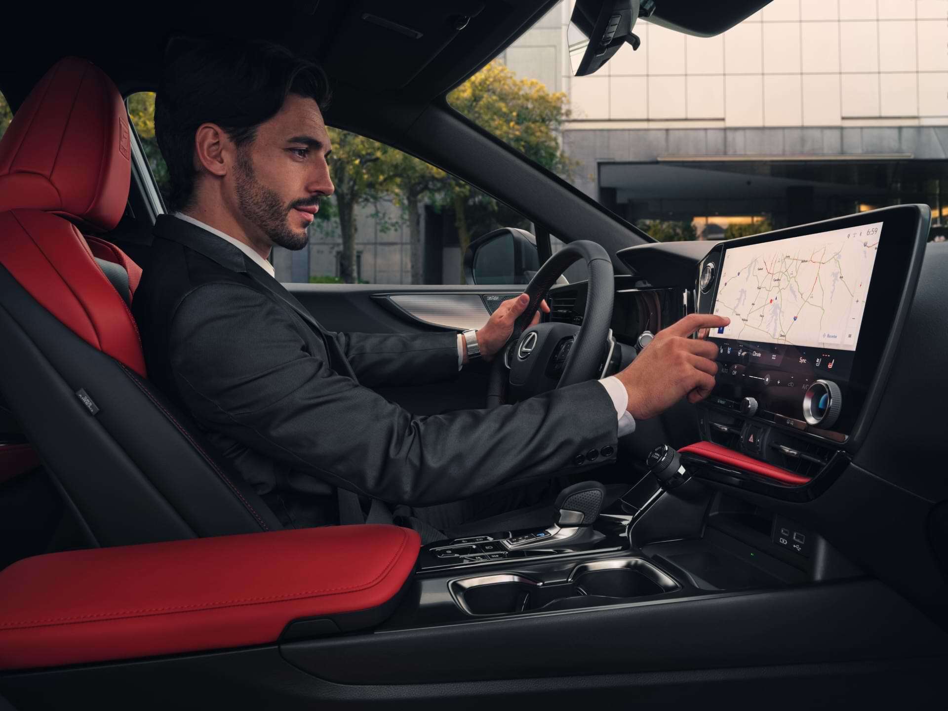 Man interacting with multimedia system of 2021 Lexus NX