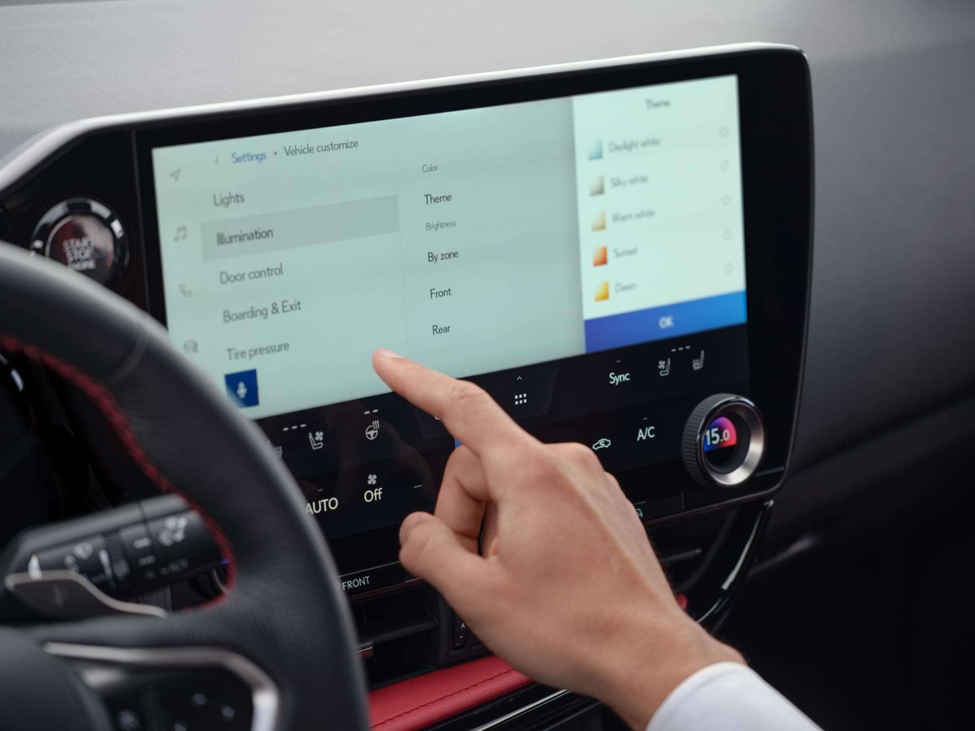 Someone selects options from the menu on the new 14.0-inch touch-display.