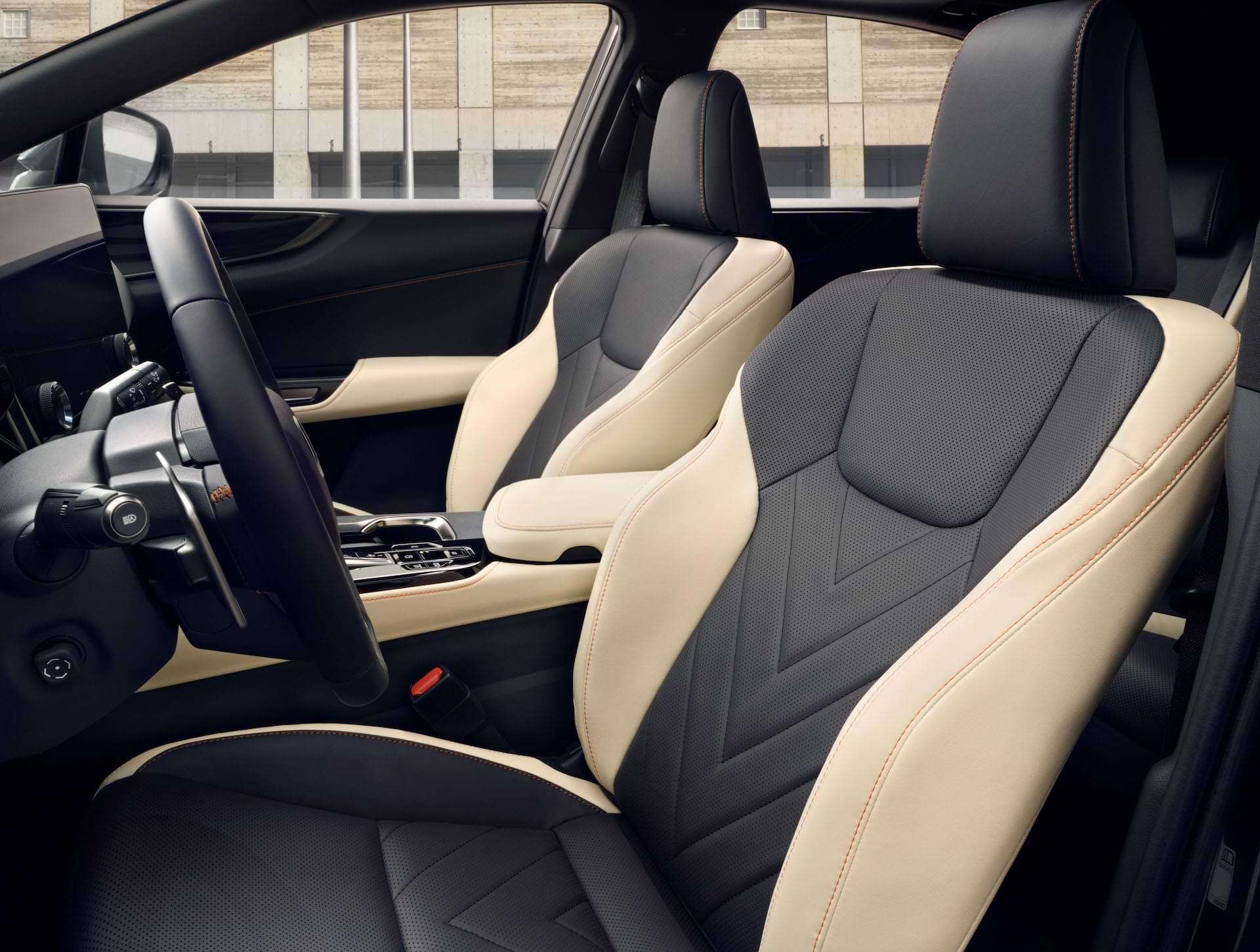 Black and cream interior of driver and passenger seats of NX