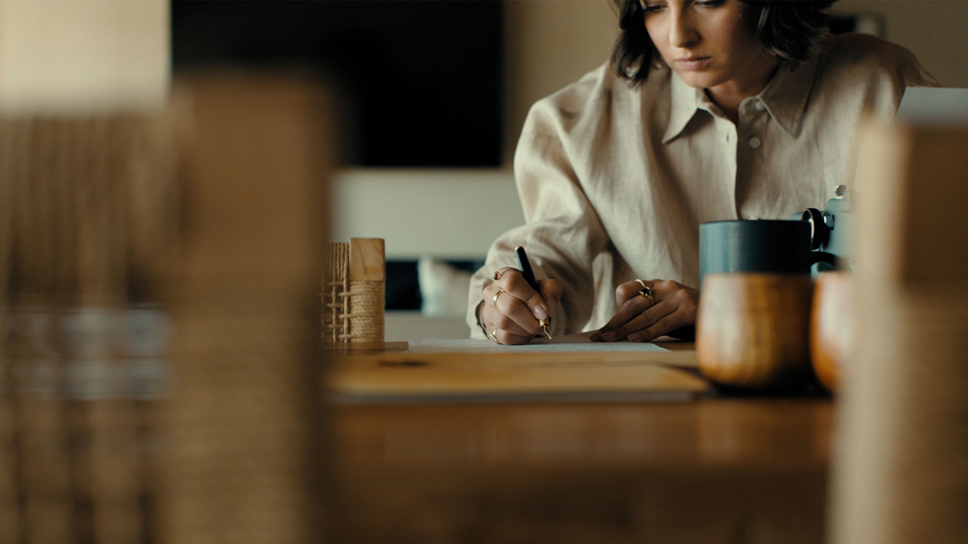 Woman signing a document